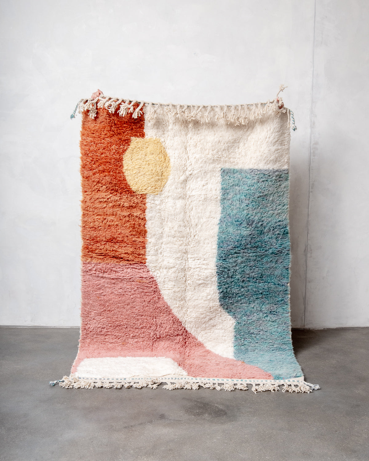 Modern, designer, handcrafted Berber rug from Morocco. Beniourain carpet with beautiful colours and patterns and fluffy wool texture.